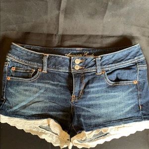 American Eagle Denim shorts with lace accent